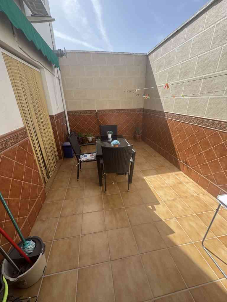 vivienda adosada a pie de calle